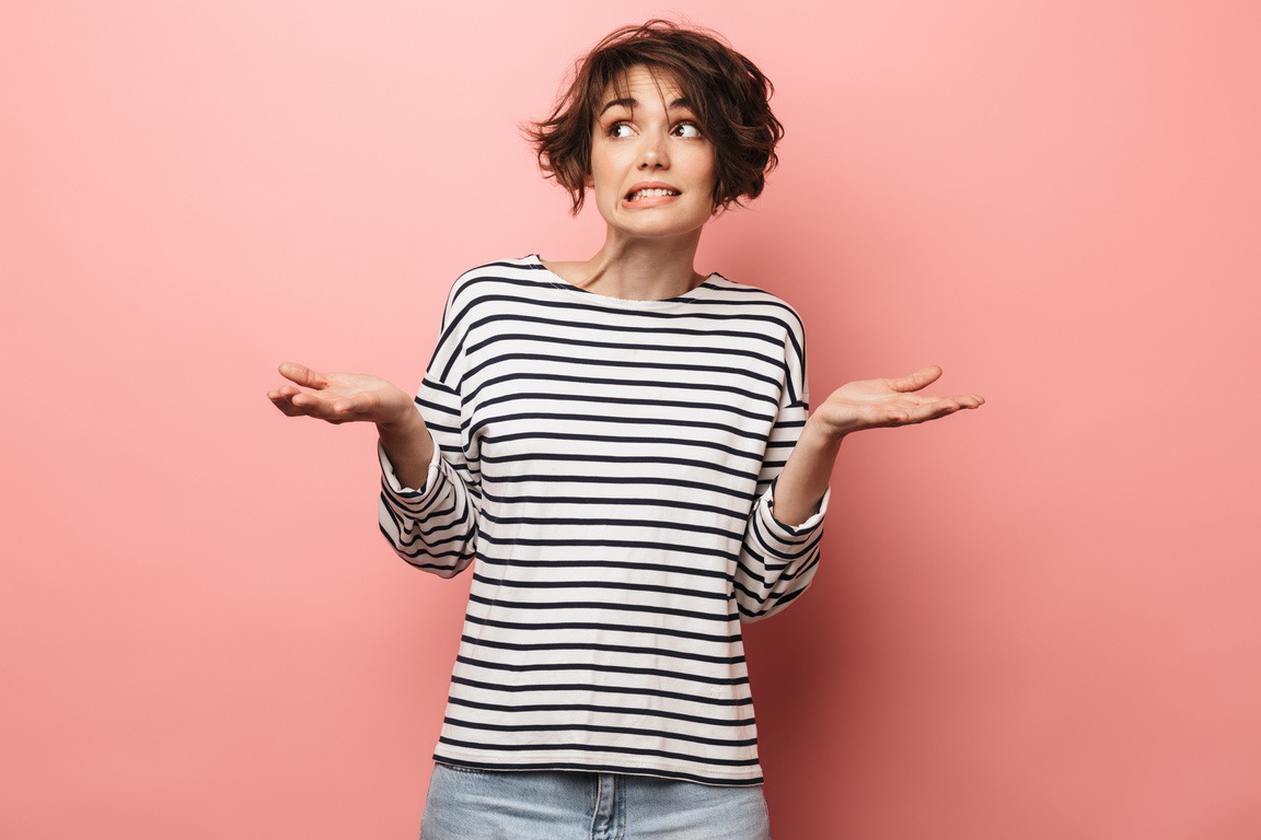 Unsure Woman Shrugging